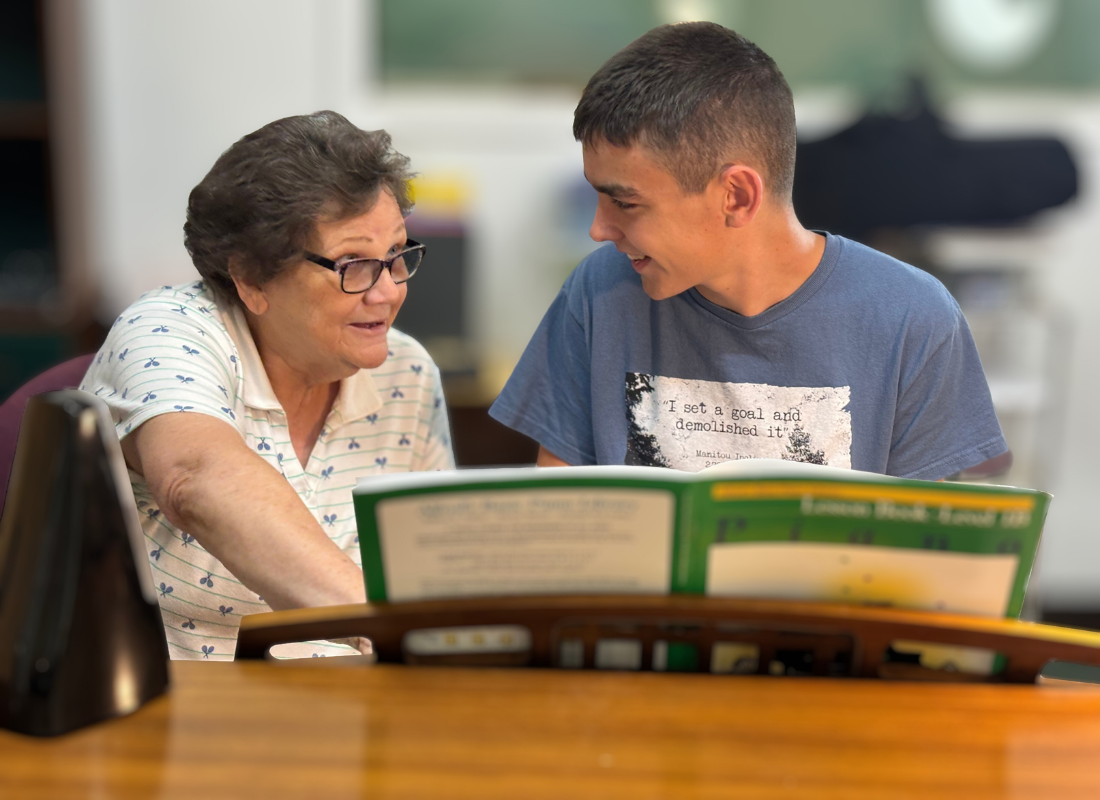 A music teacher teachinmg a learner